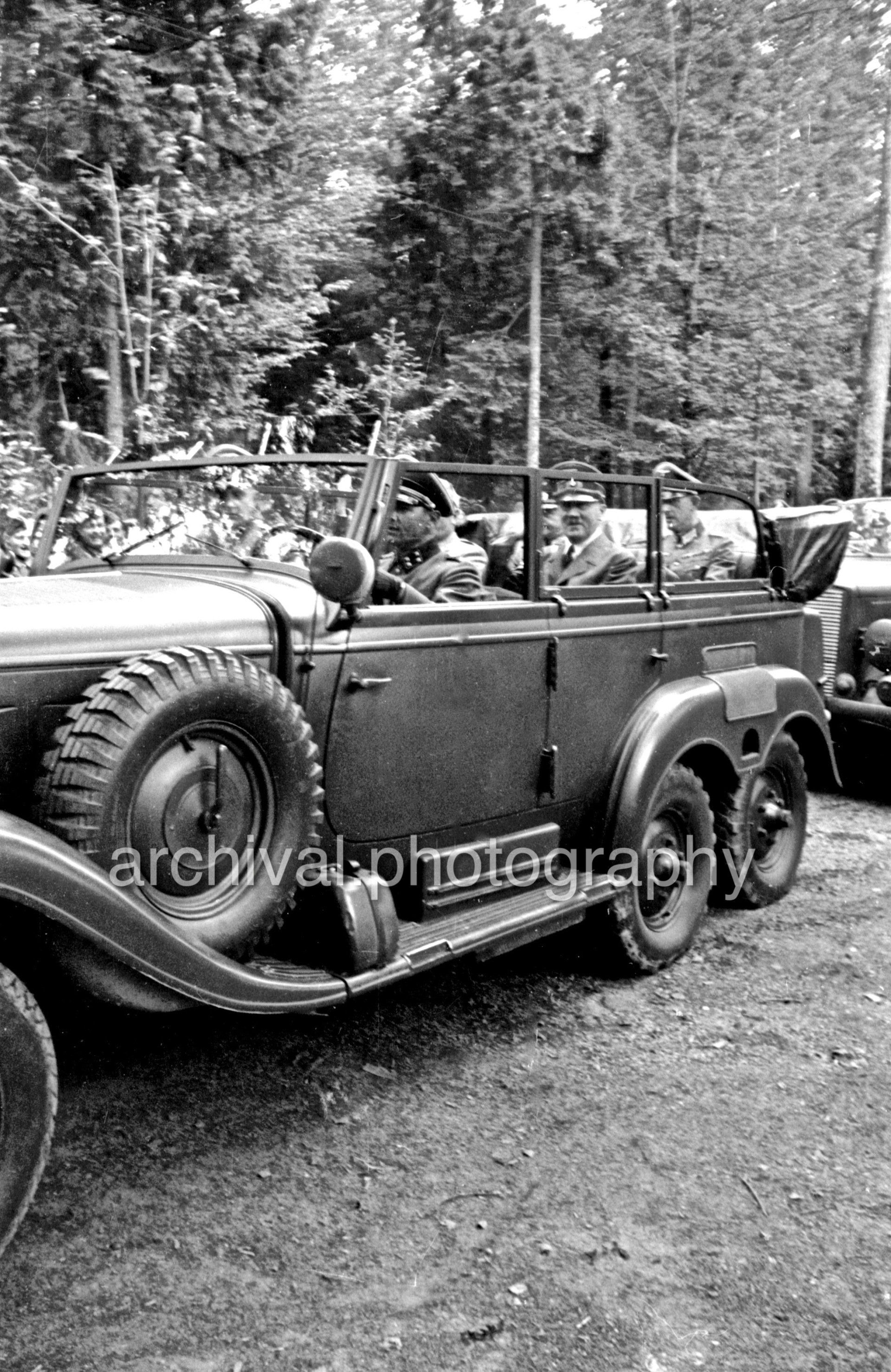 Nazi Hitler and Mussolini driving through crowd of SS - Nazi Adolf Hitler and the Italian 'Il Duce' Benito Mussolini at the 'Wolfsschanze' Wolf's Lair headquarters at Rastenburg in East Prussia - Nazi Adolf Hitler and the Italian 'Il Duce' Benito Mussolini at the 'WolfssDaimler Benz Aktiengesellschaft G4 touring wagon