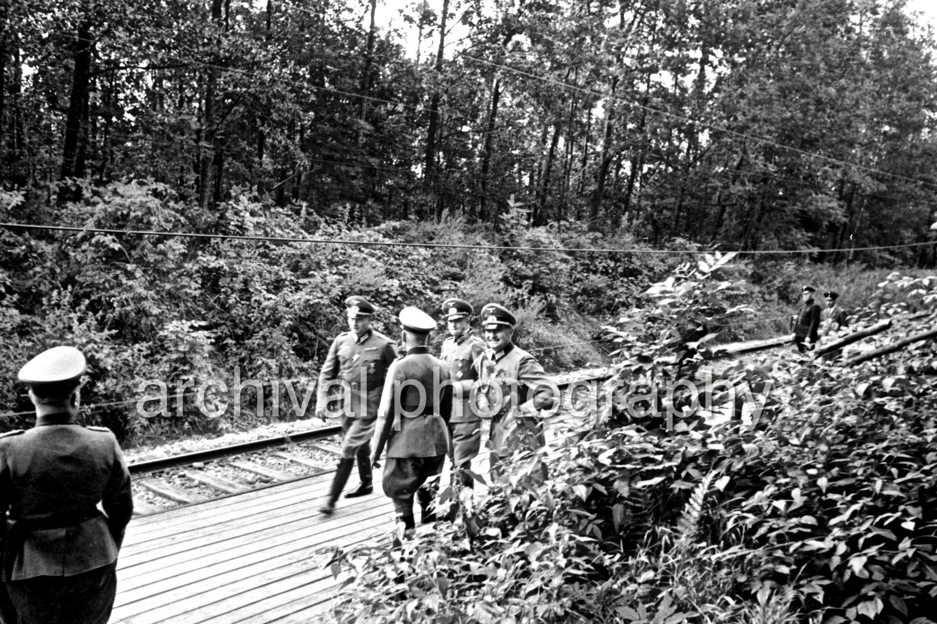German Officers walking on Train Platform - Nazi Adolf Hitler and the Italian 'Il Duce' Benito Mussolini on the train platform at the 'Wolfsschanze' Wolf's Lair headquarters at Rastenburg in East Prussia