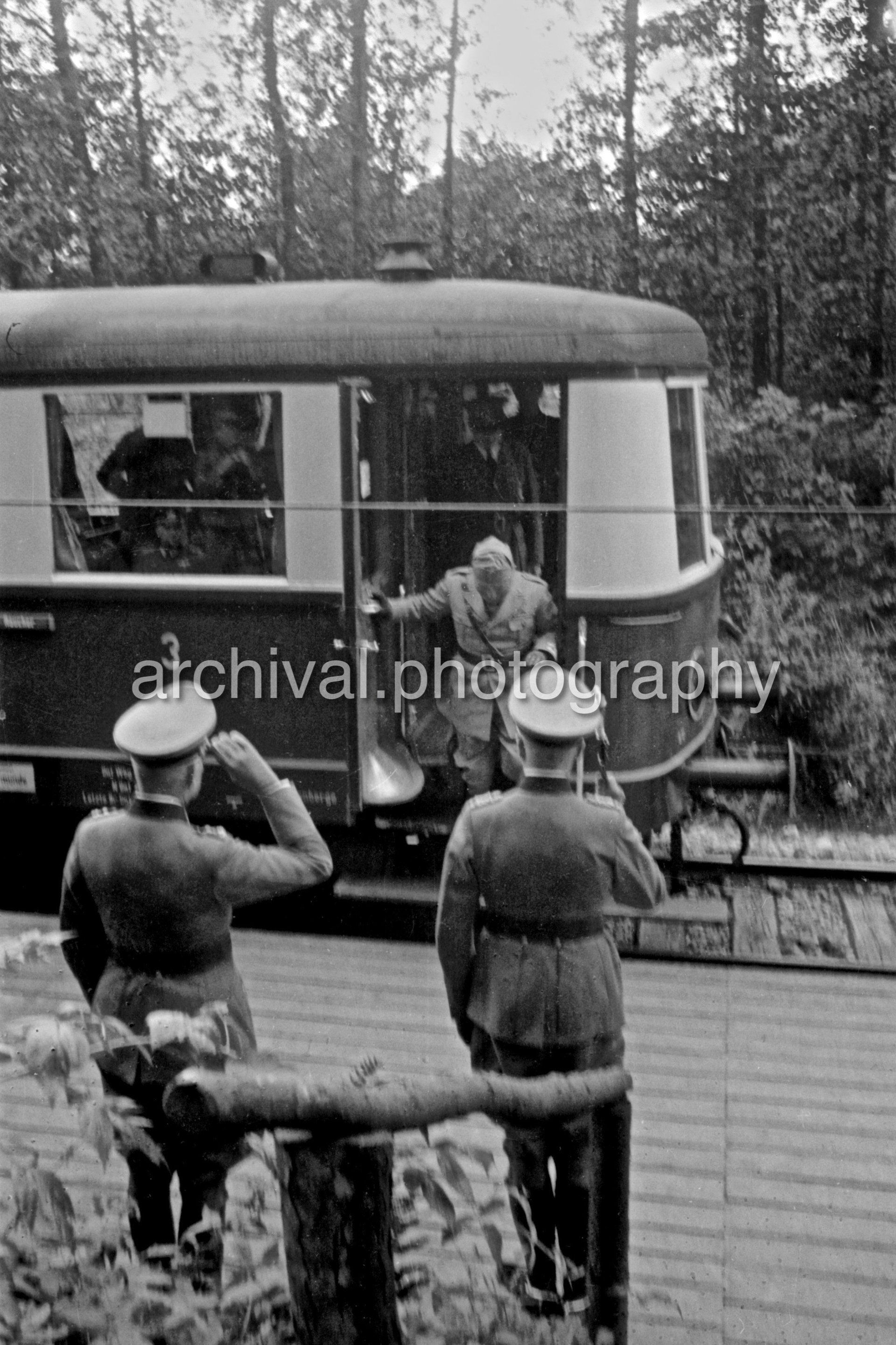 Senior Nazi German Officers stepping onto train platform - Nazi Adolf Hitler and the Italian 'Il Duce' Benito Mussolini on the train platform at the 'Wolfsschanze' Wolf's Lair headquarters at Rastenburg in East Prussia
