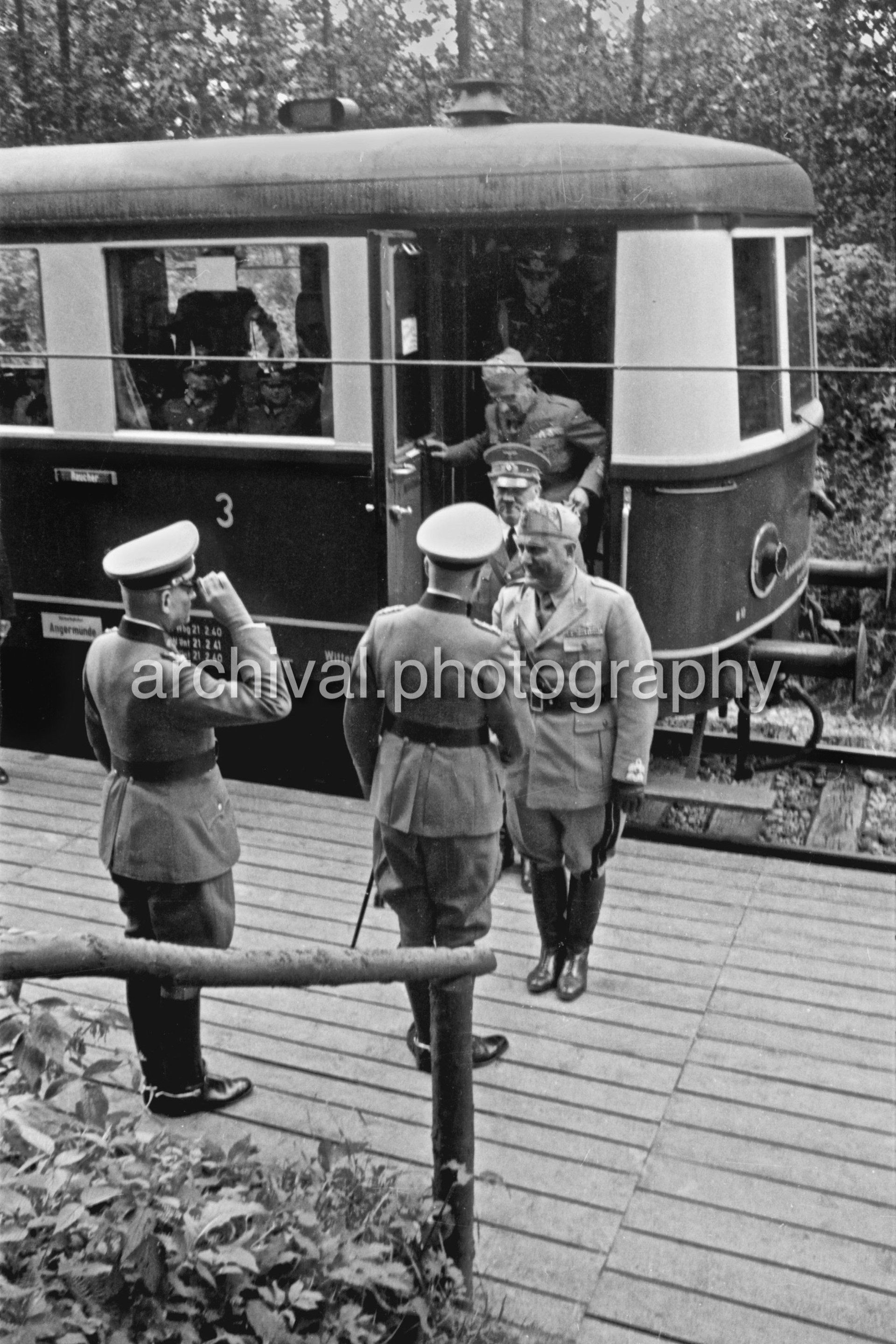 Mussolini getting off Train - Nazi Adolf Hitler and the Italian 'Il Duce' Benito Mussolini on the train platform at the 'Wolfsschanze'  Wolf's Lair  headquarters at Rastenburg in East Prussia
