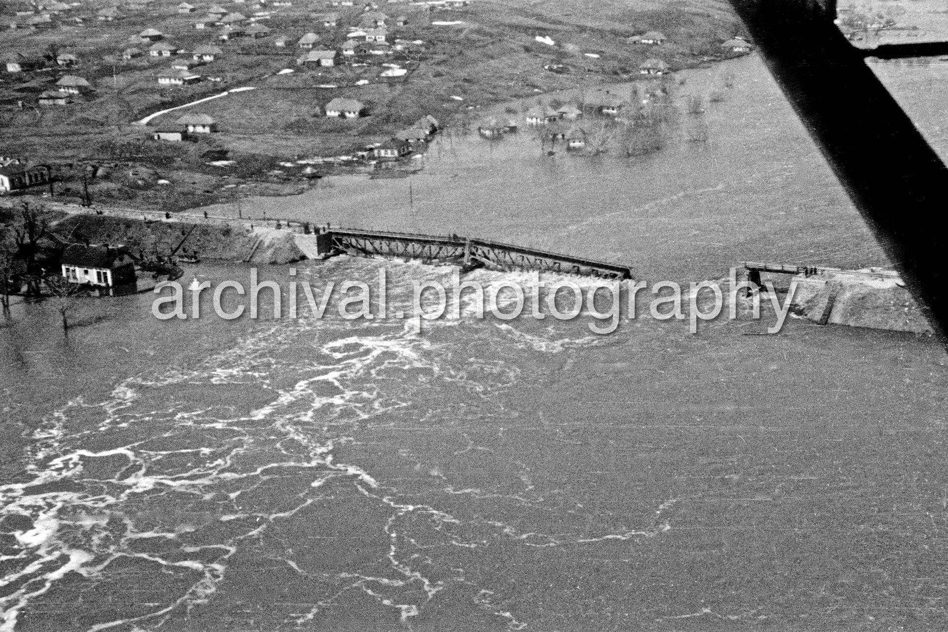 Destroyed bridge flooded - Nazi Luftwaffe Field Marshal Hermann Goering attending an aerial bomb damage briefing at the 'Wolfsschanze' headquarters at Rastenburg in East Prussia - Wolf's Lair