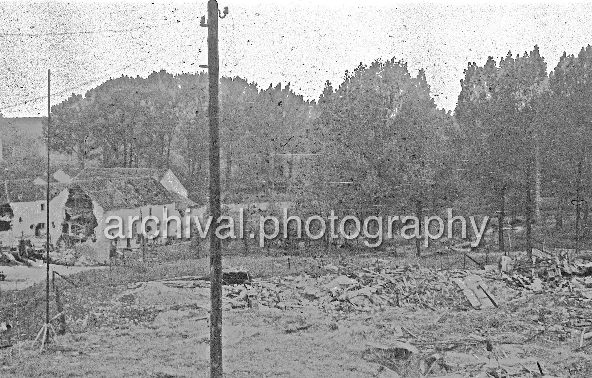Phone poll with fields in the distance - Damaged Bunker - Belgian Fort Eben-Emael May 1940
