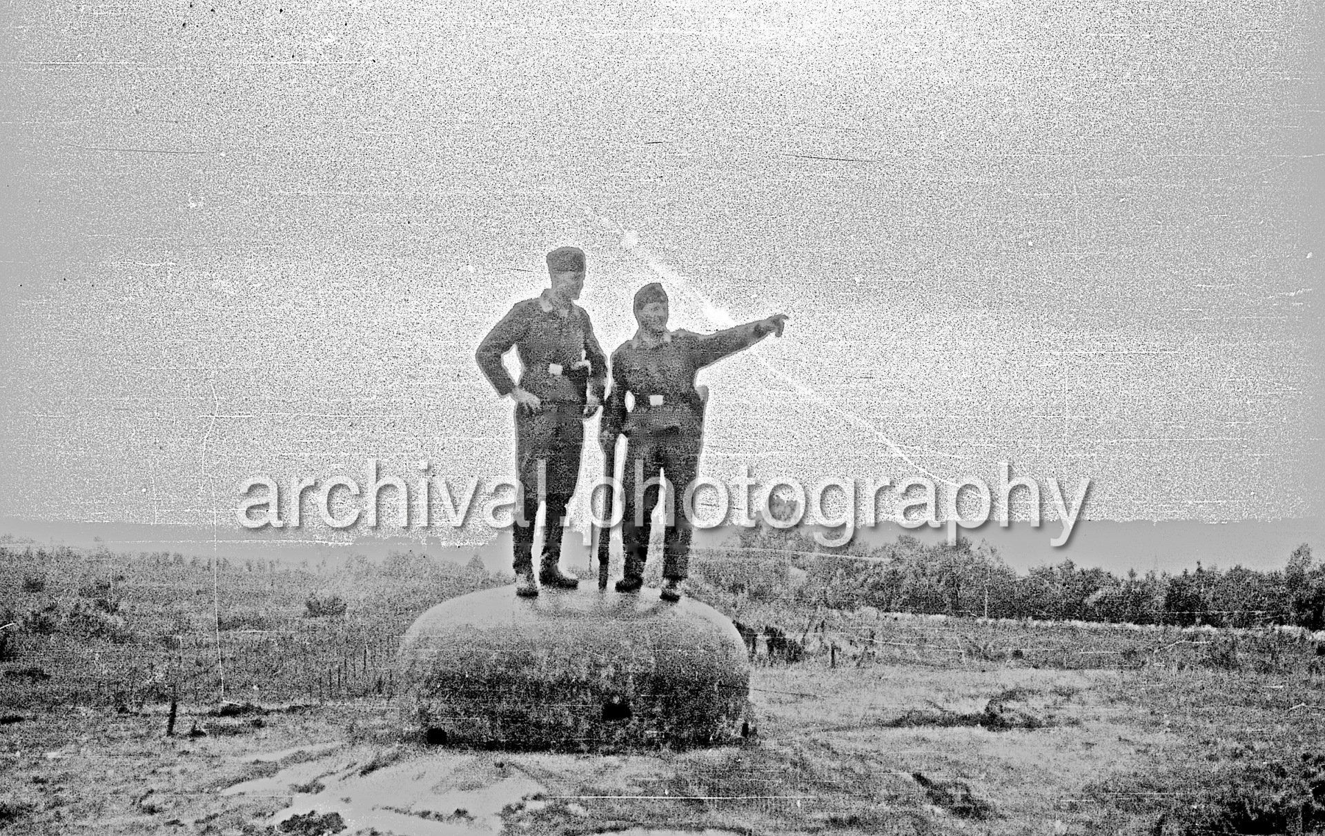Two soldiers standing on top of Belgian Fort Eben-Emael May 1940