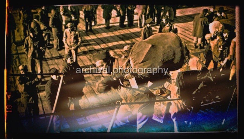 US ARMY SOLDIER WITH DUFFLE BAG DISEMBARKING FROM TRANSPORT SHIP