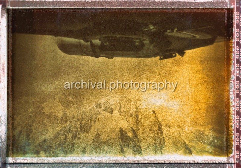 Candid WWII Photos Of GI's From All Sides - WWII PHOTO OF TALL MOUNTAIN TOP TAKEN FROM BELLY OF BOMBER