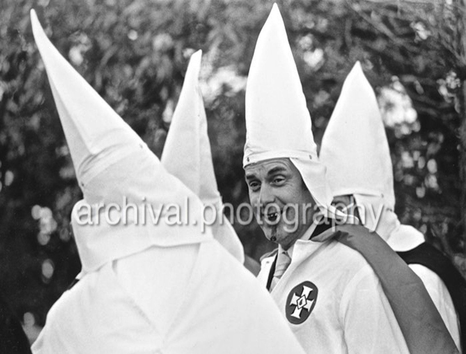 KKK members speaking with eachother