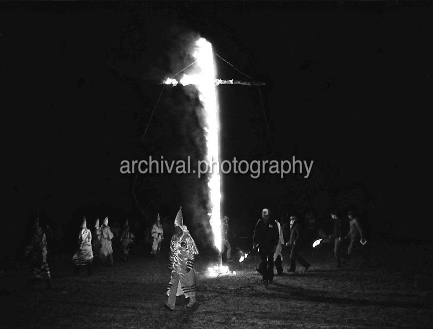Ku Klux Klan - Burning cross in a field