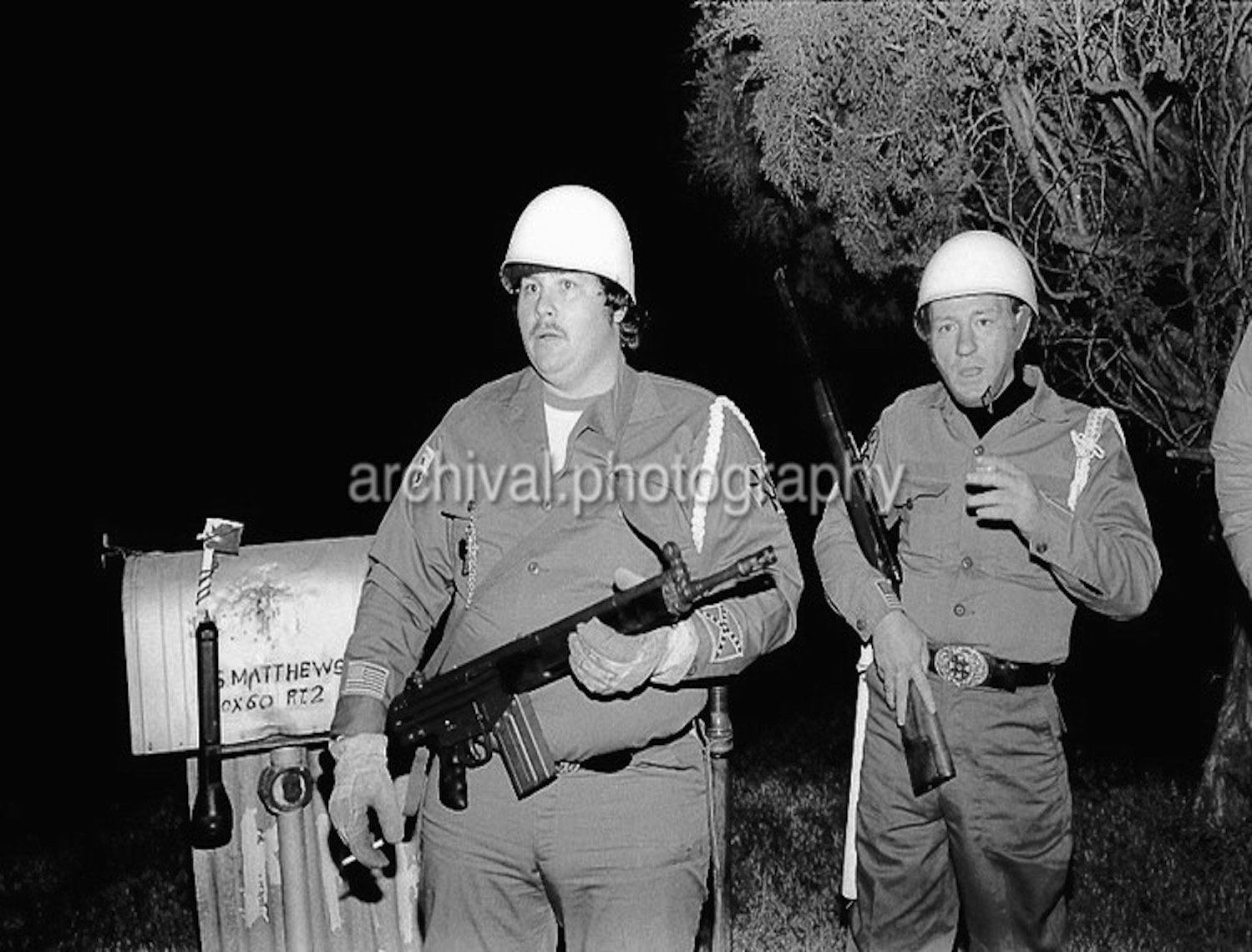Ku Klux Klan - Two KLAN MEMBERS holding HK 93 AND BOLT ACTION RIFLES