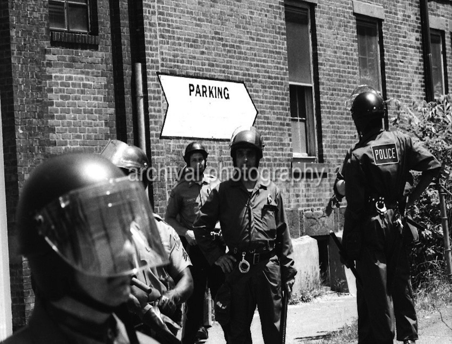 Police officers standing outside building