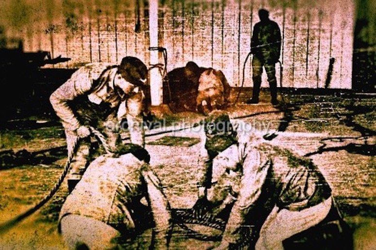 Candid WWII Photos Of GI's From All Sides - SOLDIERS laying rope down in barn