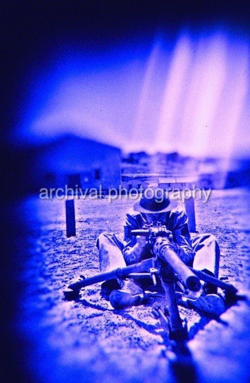 US ARMY SOLDIER WITH 50 CALIBER MACHINE GUN