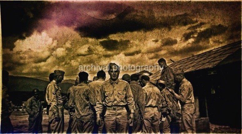 Candid WWII Photos Of GI's From All Sides - Group of US ARMY soldiers huddled together AT SUNSET