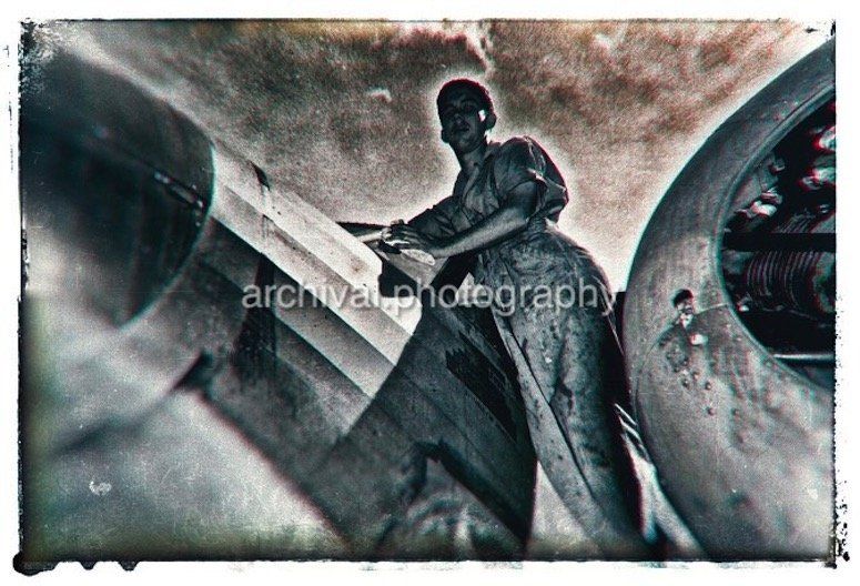 US AIRMAN standing on side of plane - Candid WWII Photos Of GI's From All Sides