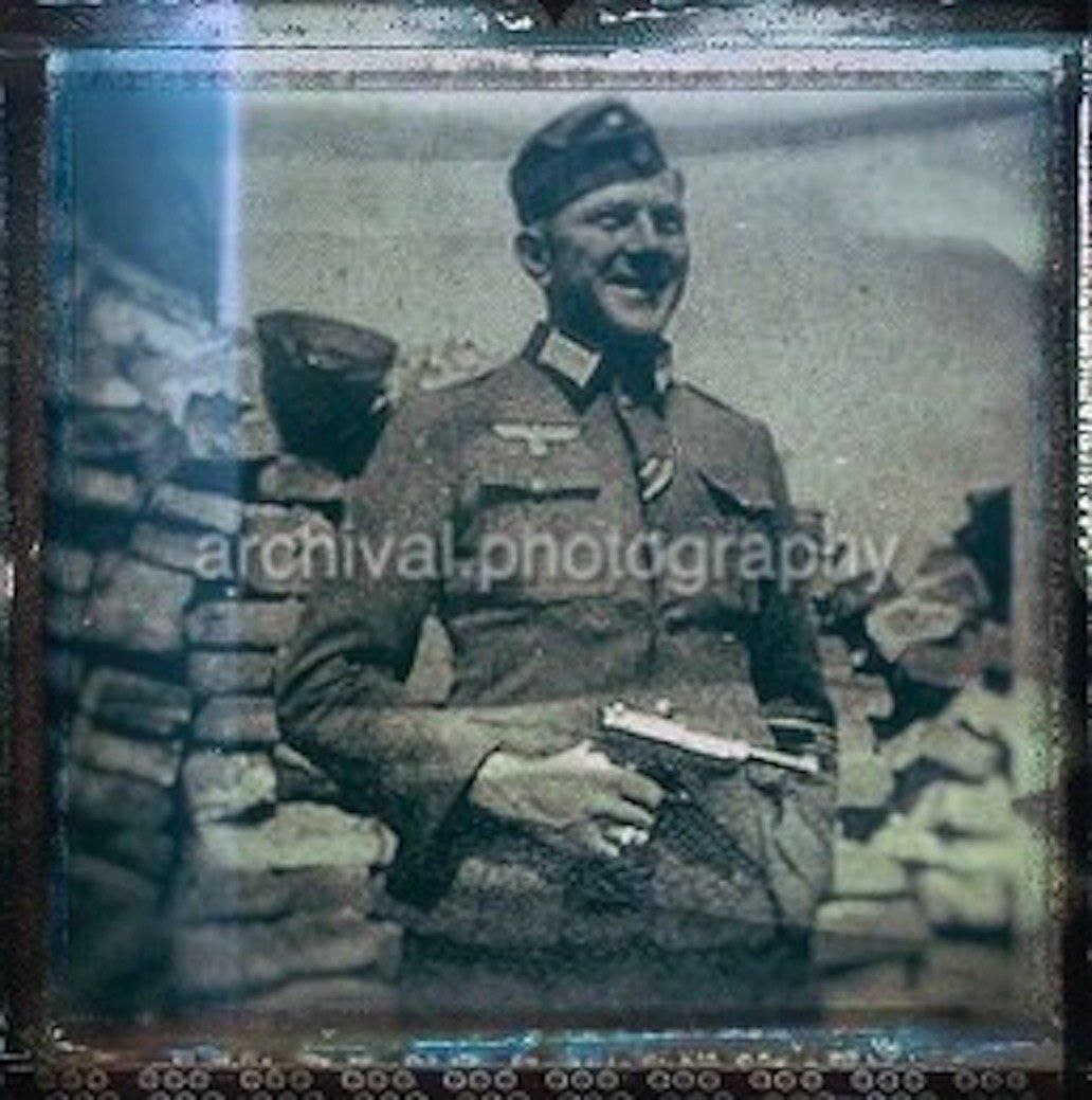 NAZI Soldier standing in front of bunker HOLDING WALTHER P-38 handgun