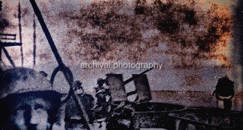Candid WWII Photos Of GI's From All Sides - US NAVY SAILOR IN MIDDLE OF BATTLE WITH ANTI-AIRCRAFT GUN mounted on top of ship