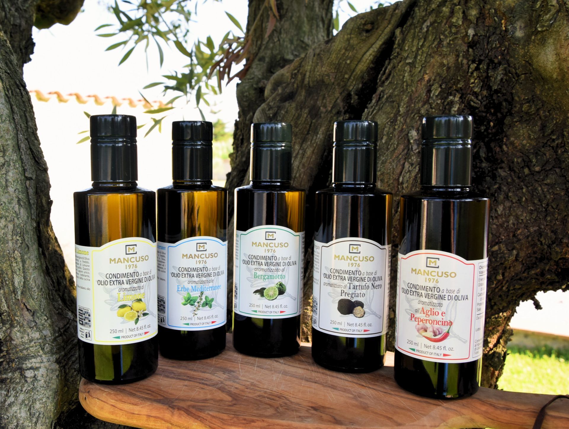 Condimenti a base di olio extravergine d'oliva, bergamotto, limone, peperoncino, mediterraneo