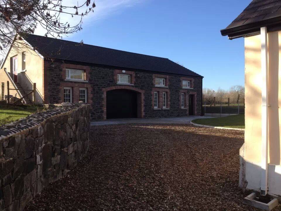 New Build Homes-homes new-New Home-Stone wall tiles-Krend-stone wall cladding-Open Plan-Kitchen-Dining-Grand Designs-Classic car garage-games room-cinema room