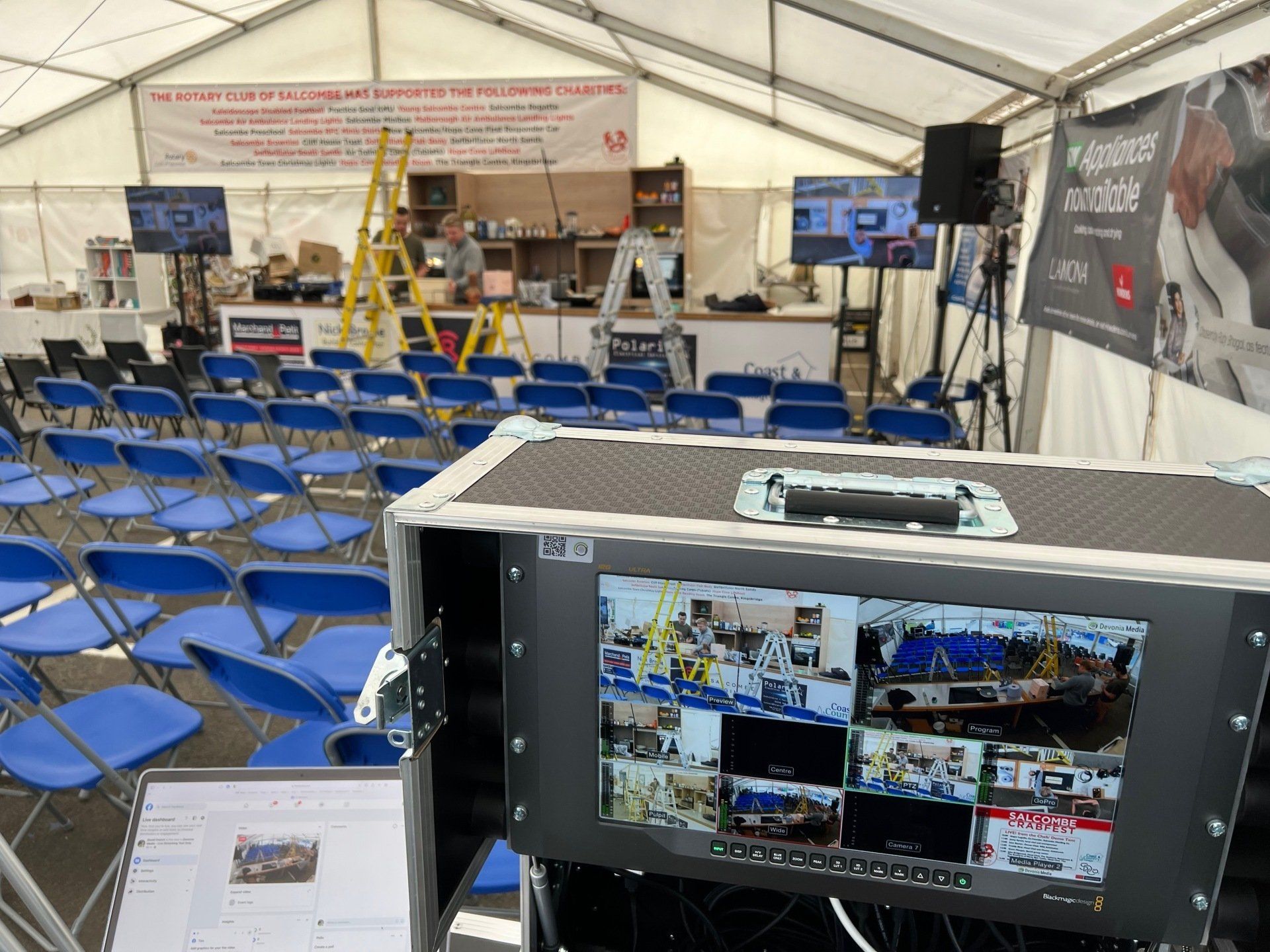 Setting up for livestream in food marquee