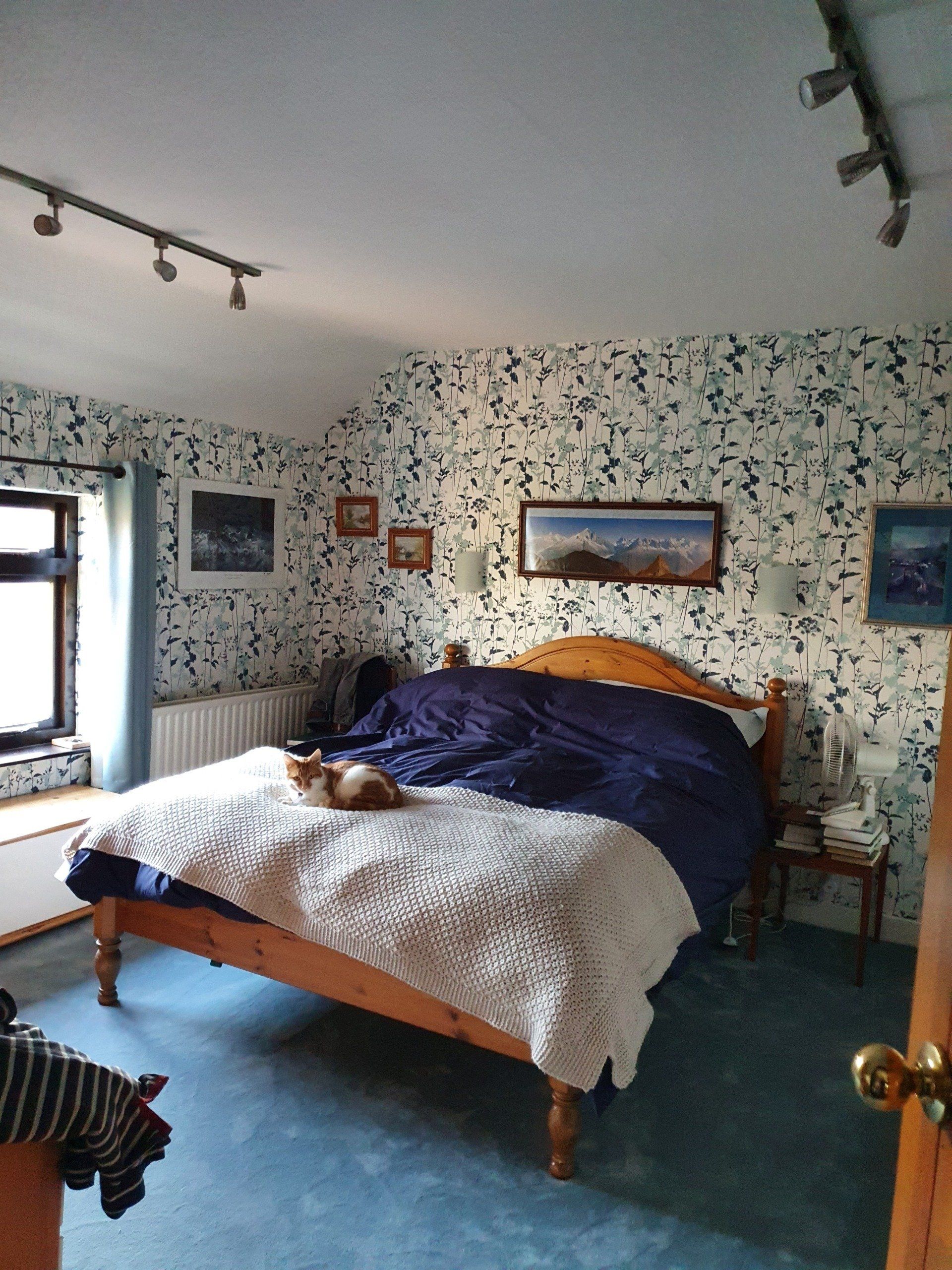 Patterned wallpaper in bedroom Wallpapering service in Nottingham