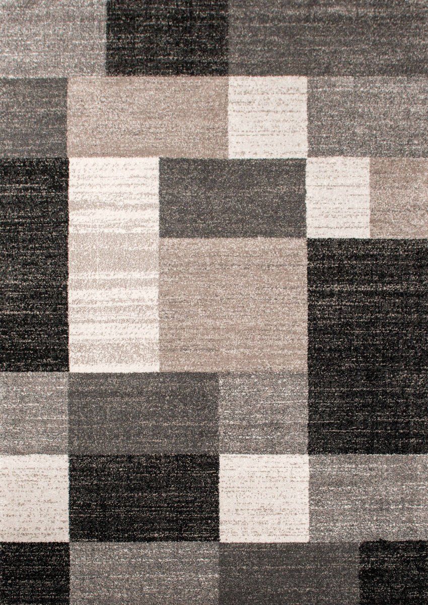 Verschiedene Teppiche mit Feldermusterung.