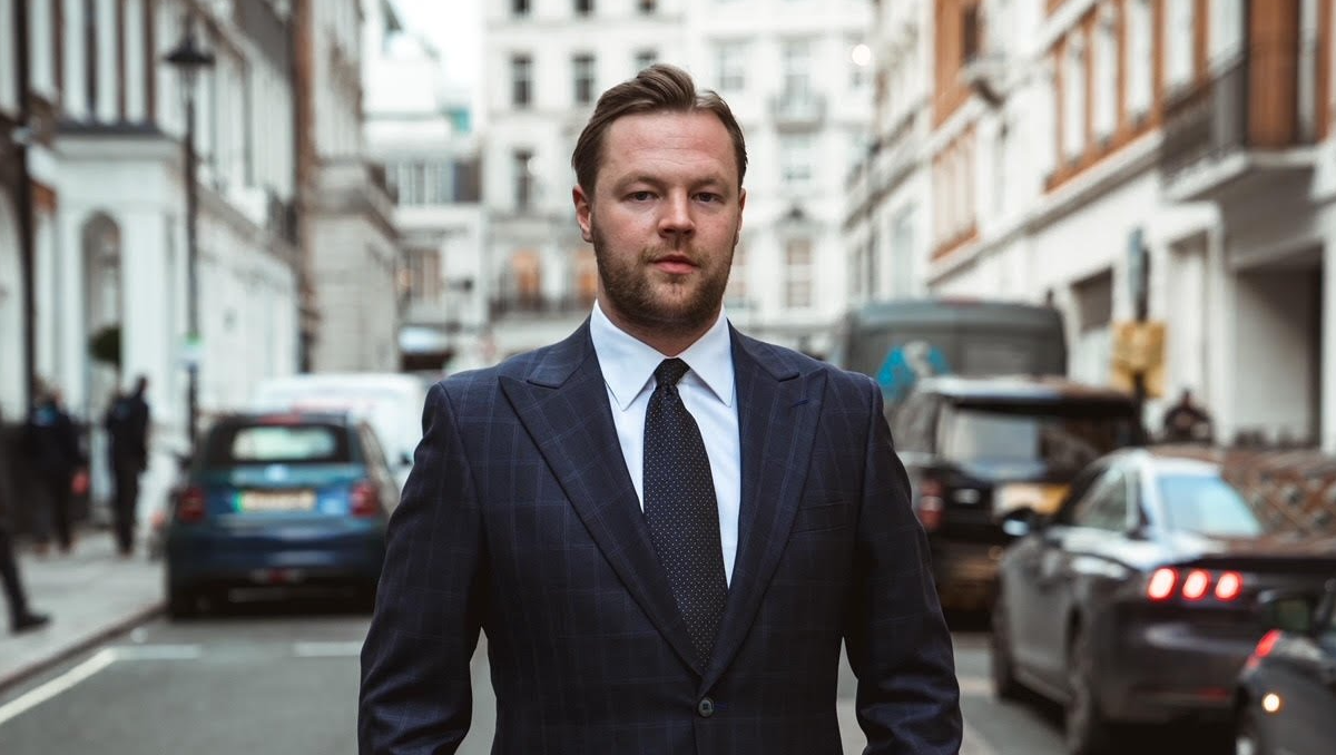 Business suits from Adam James Bespoke - shown here by a dapper customer