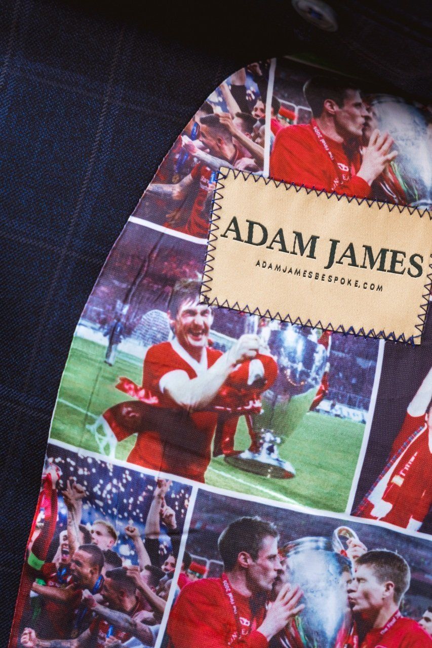 A savvy customer dons a custom-made suit with personalised lining from Adam James Bespoke