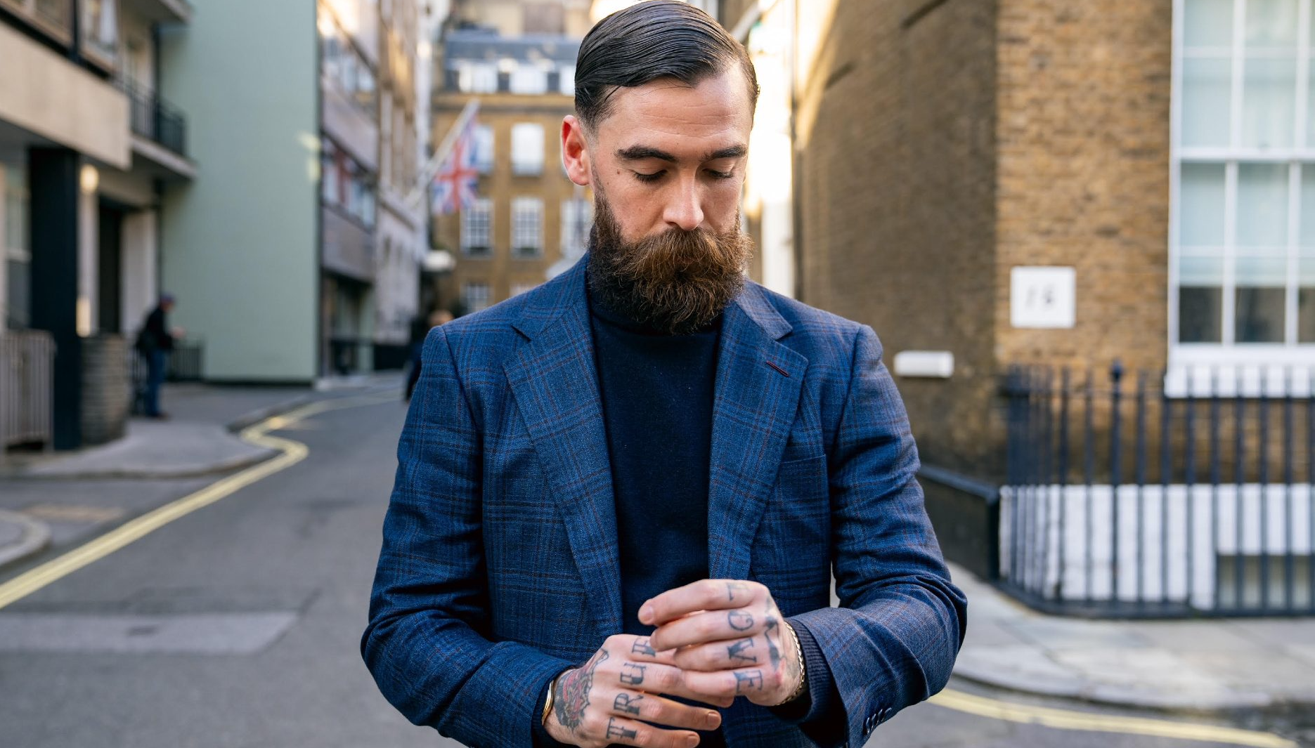Adam Davies, tailor at Adam James Bespoke, wears an eco-conscious, sustainable Vegan suit