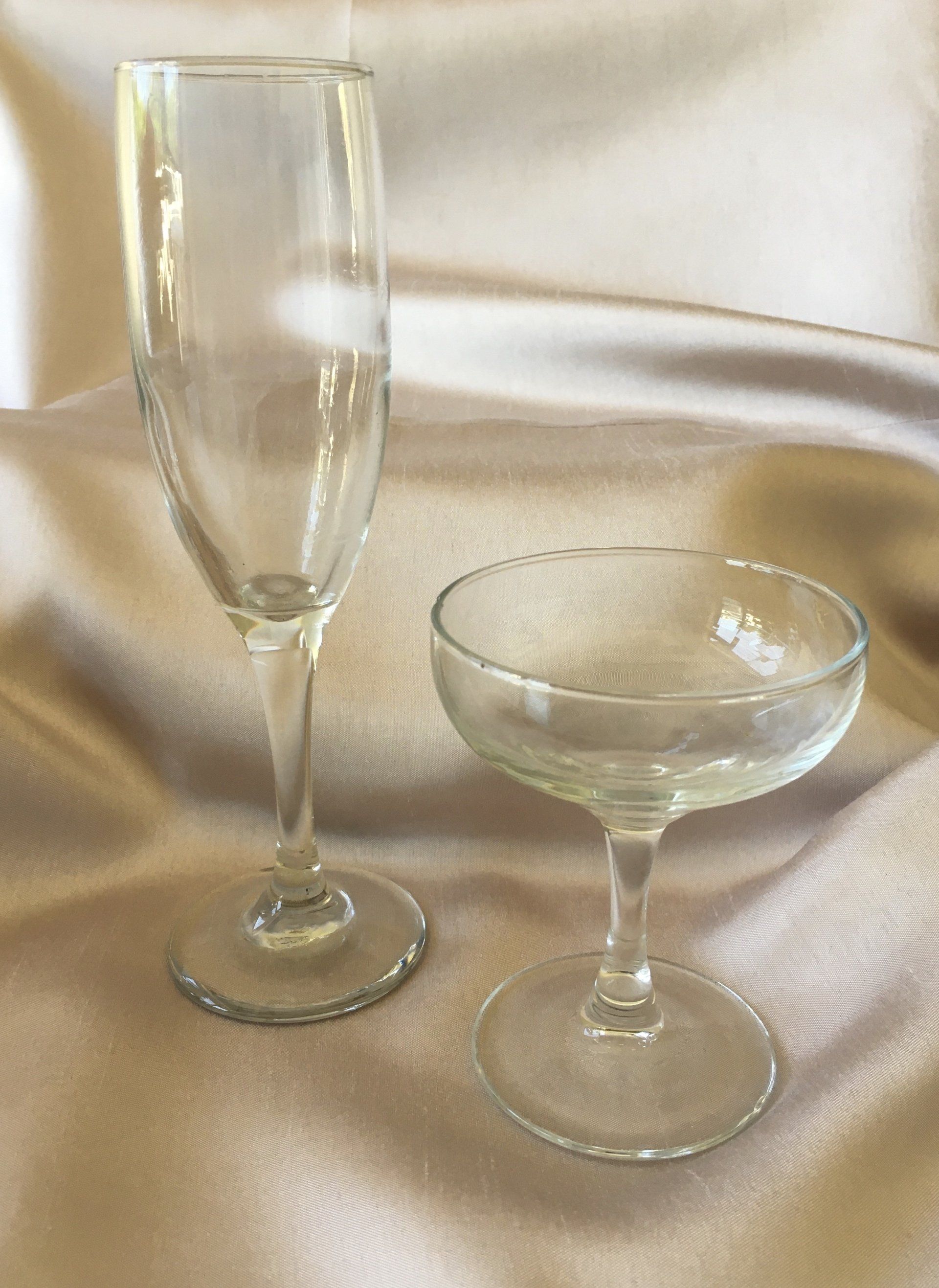 3 examples of event glassware (champagne flute and cocktail stemware)