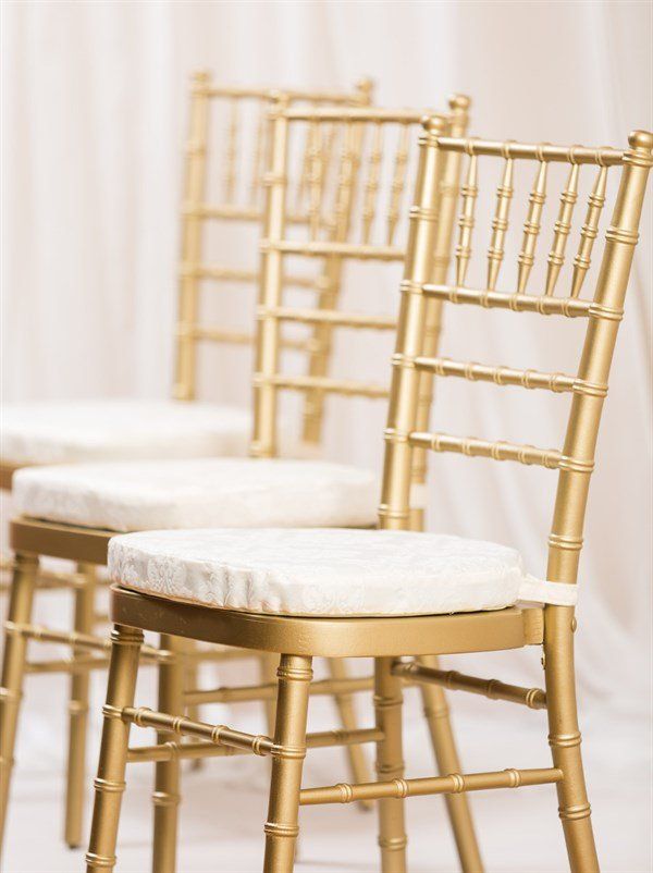 Chiavari gold chairs with seat pads