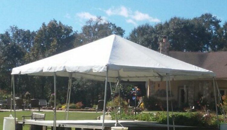 outdoor tent setup with tables