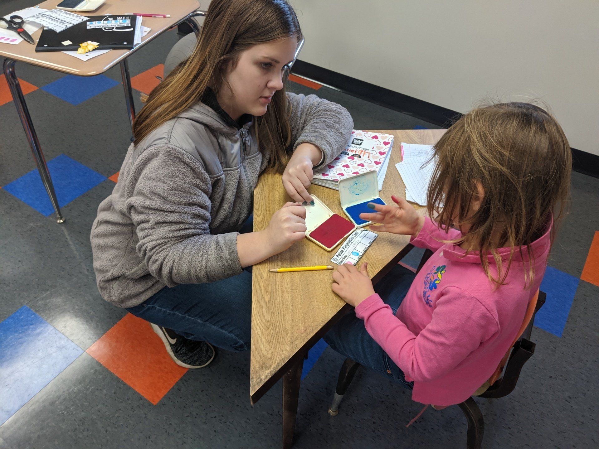 Image of Student and Teacher at the Sleek Academy