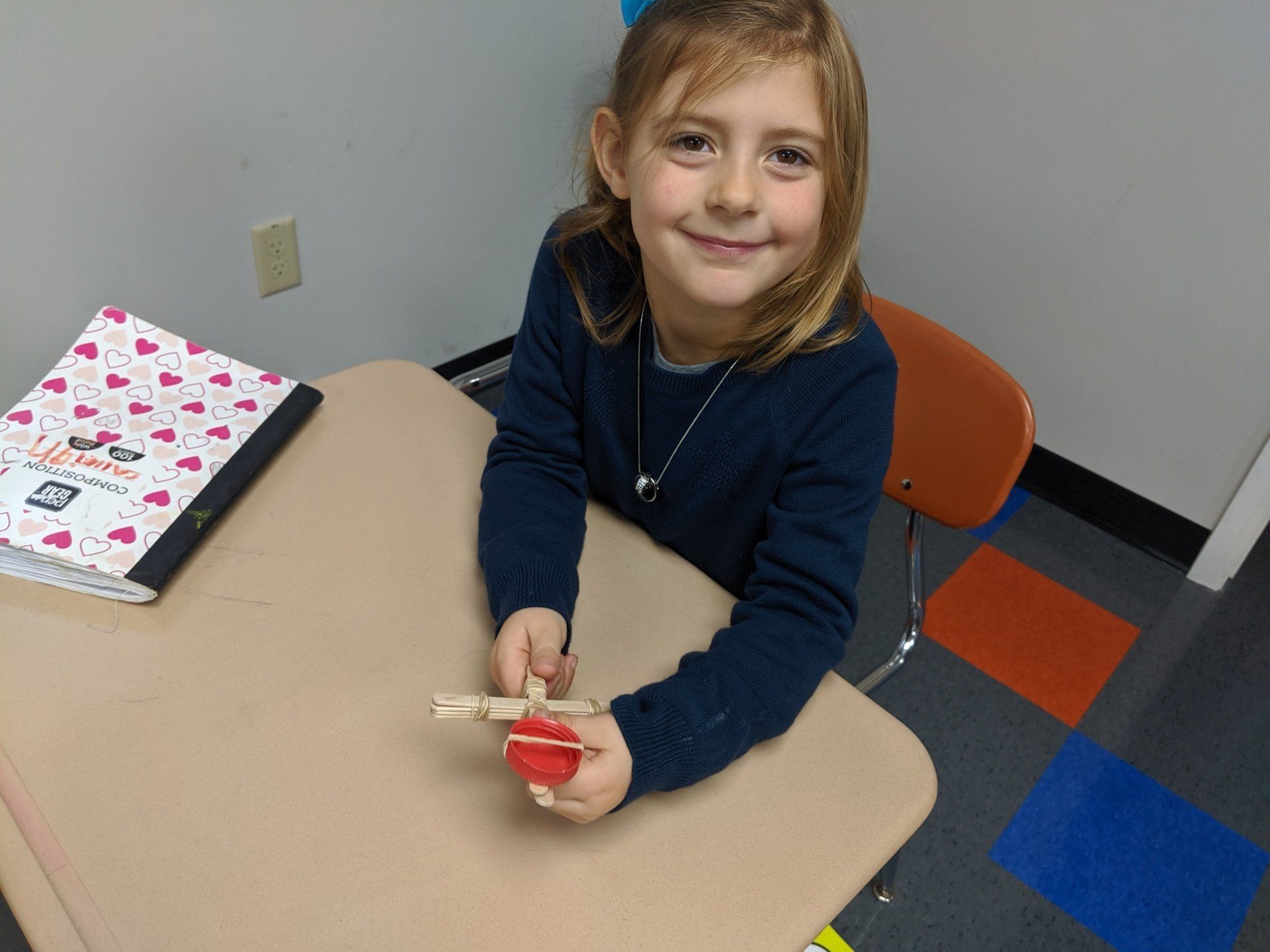 A Sleek Academy Student Smiling Image