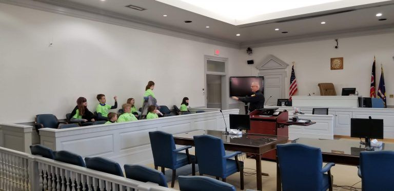 Image of the students of Sleek Academy in the Wood County courthouse