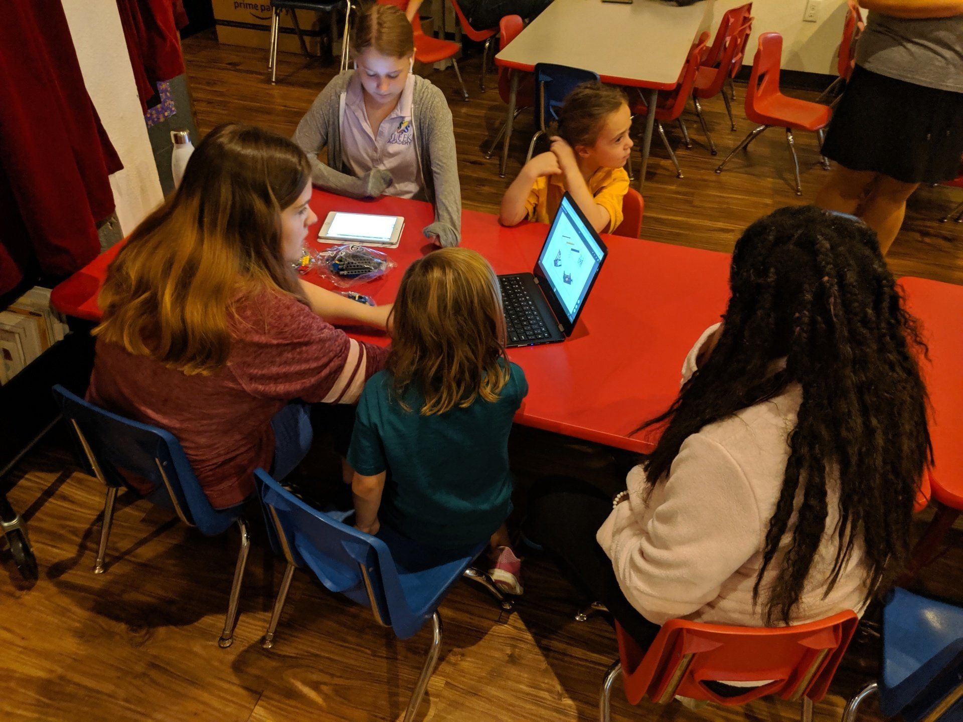 Groups of Students Learning at Sleek Academy Image