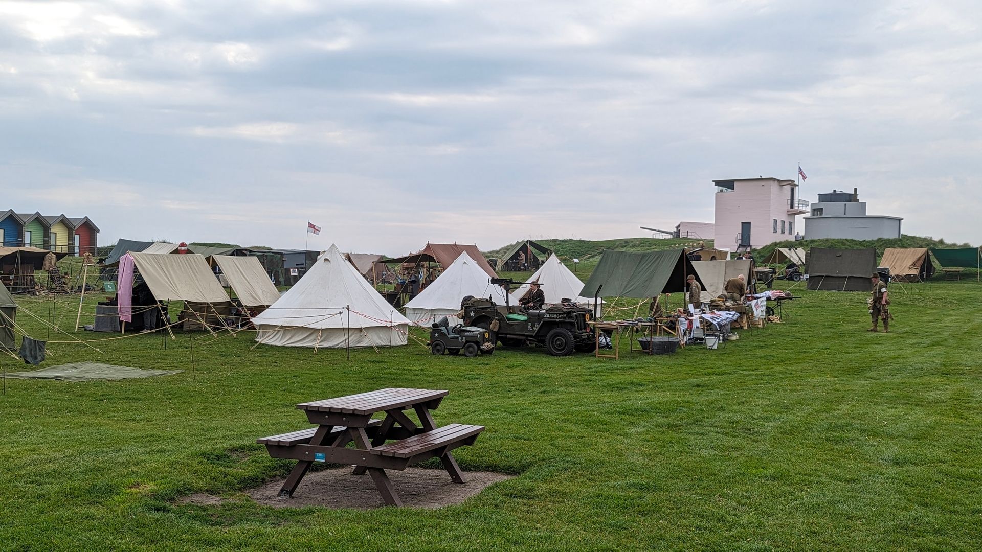 Tents of reenactment groups and other organizations with Blyth Battery in the background