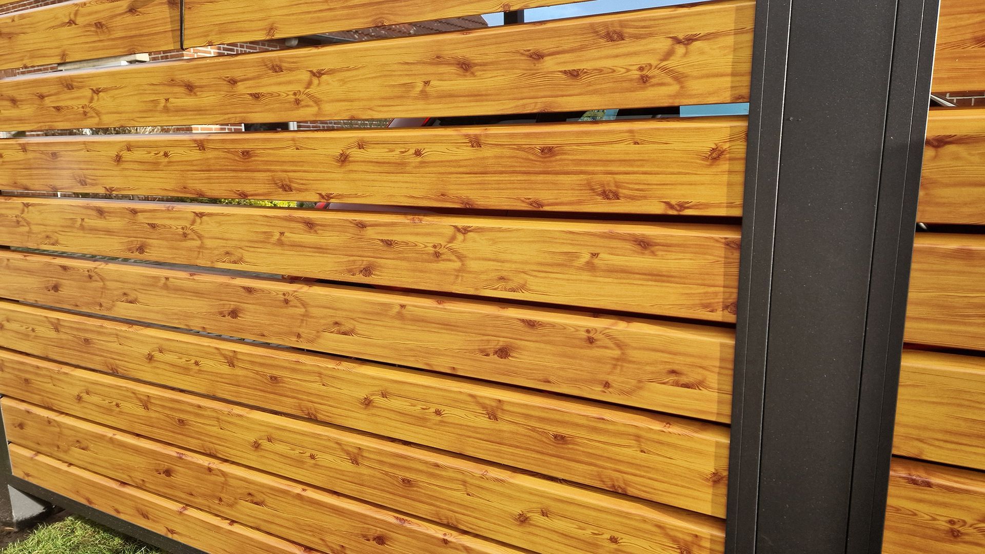Alu Carport mit Seitenwand in Holz Optik kaufen