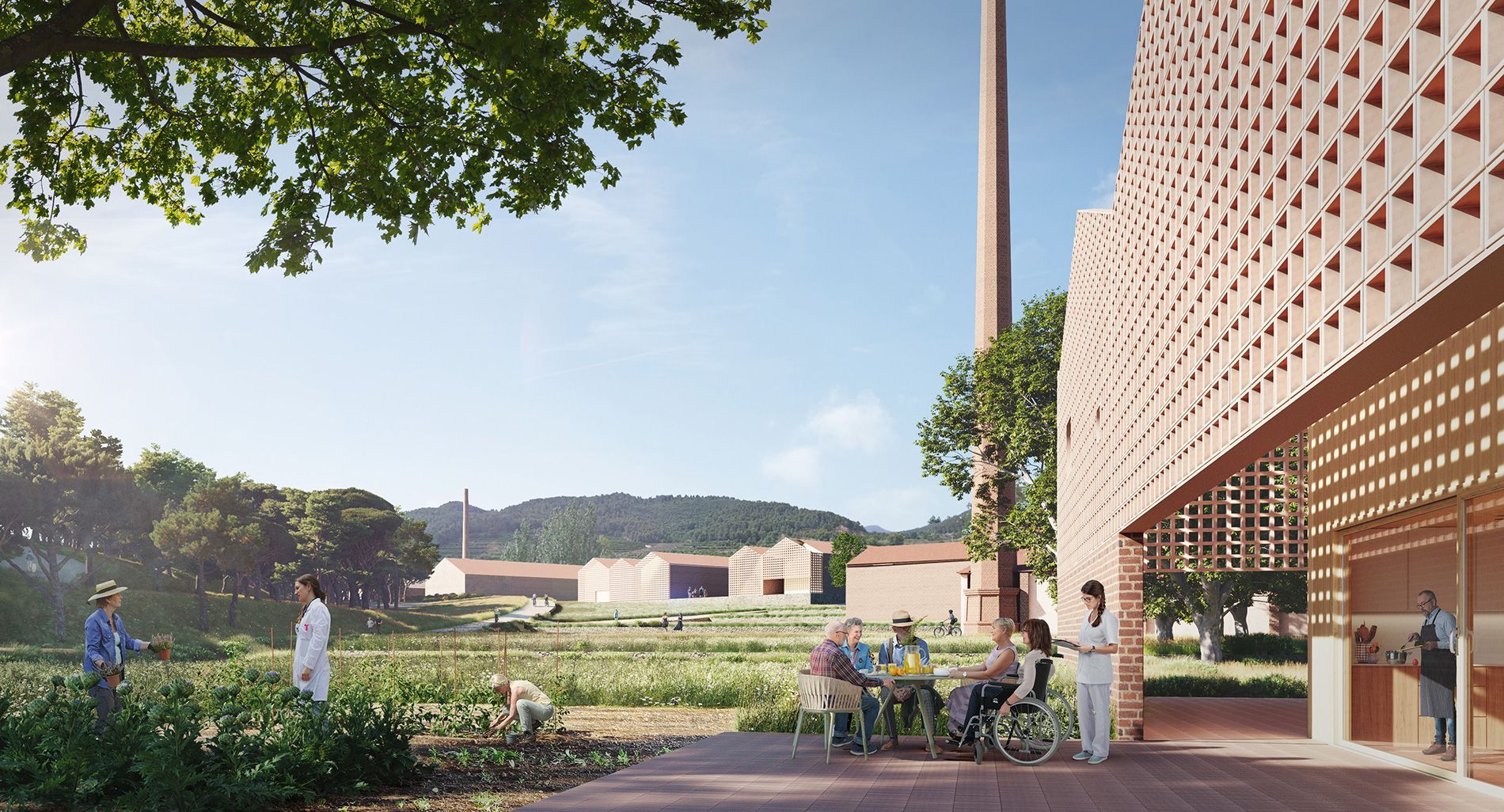 Residentes de los cohousing senior de Els Rajolars d'Oliva disfrutan de una tarde de verano junto al paisaje industrial renaturalizado