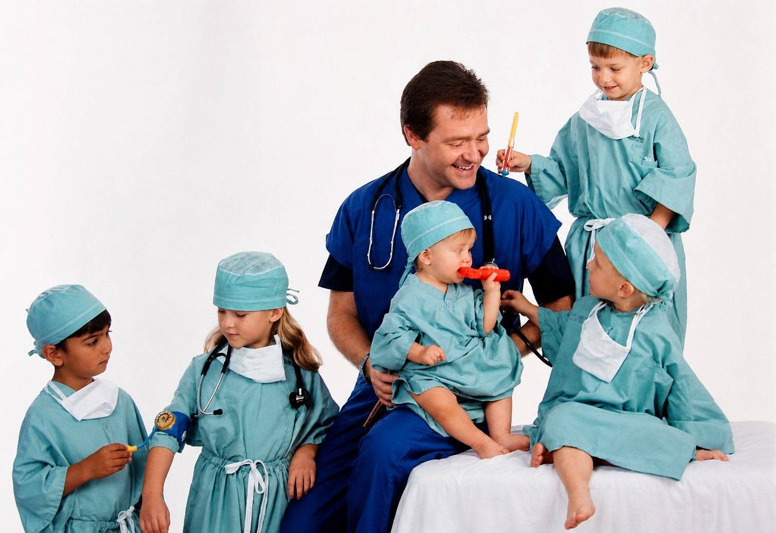 Dr. Jim Carlile with young patients at Carlile Pediatrics