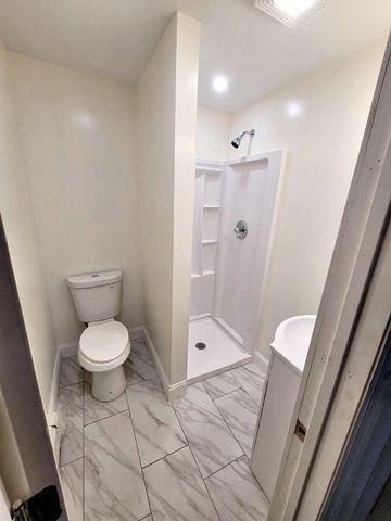 Bathroom with stall shower