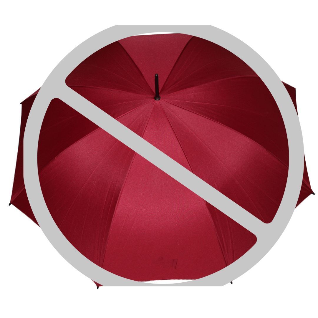 red umbrella with null sign through it.