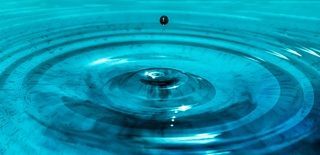 ripple effect of a drop in water