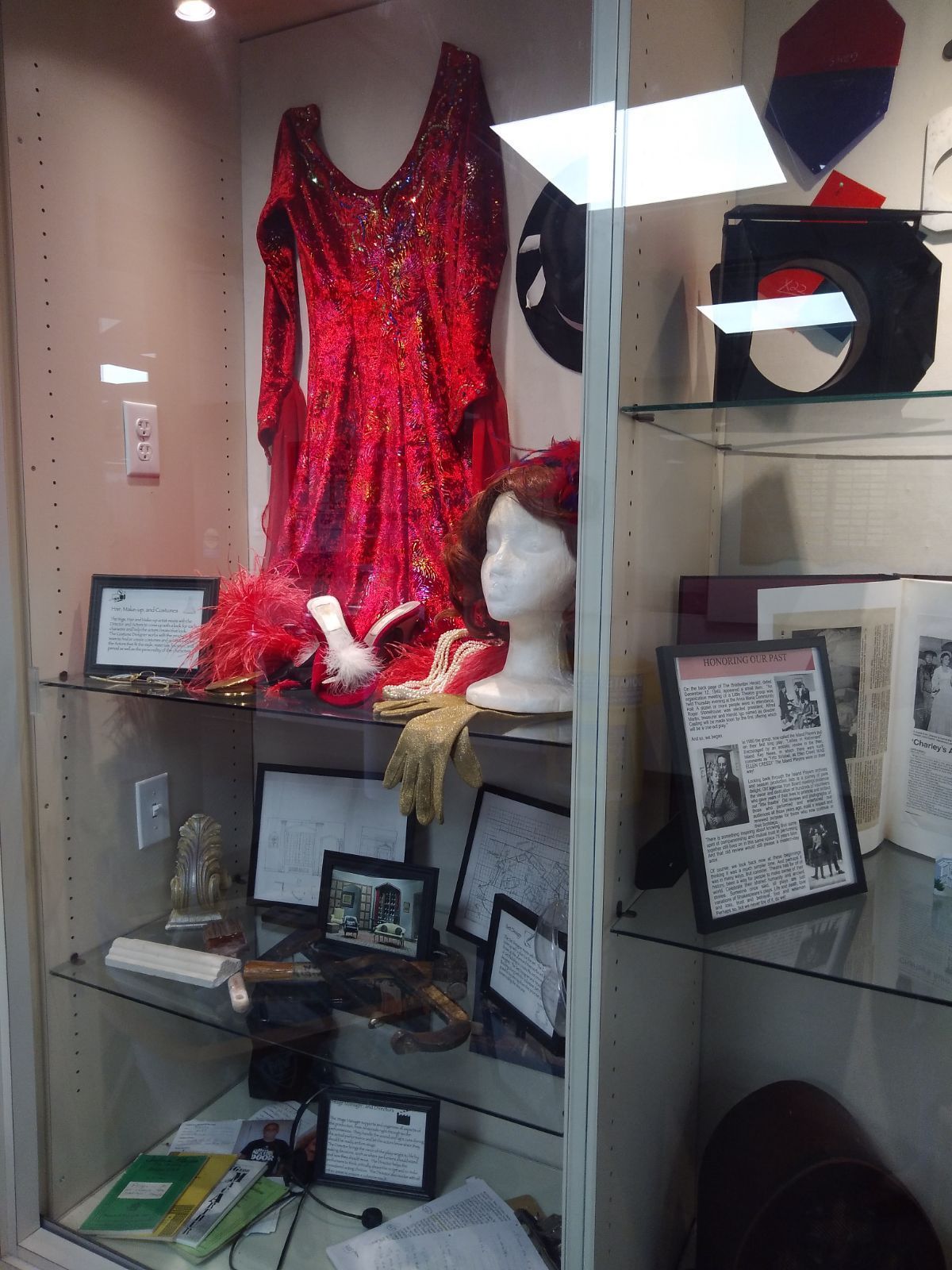 The Island Players display costumes, props, and technical materials at the Anna Maria Island Library.