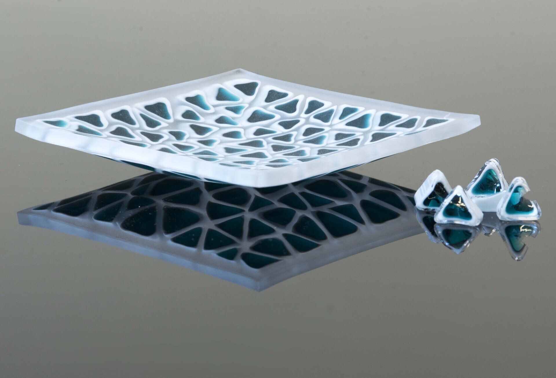 Murano glass bowl made by melting together sections of glass rods in a furnace, with each section depicting a small decorative motif. This technique is called “Millefiori Murrina Glass”Traditional decorative object typical of Murano glass processing. Artistic work made entirely by hand. The surface of these objects has a matte finish that makes it pleasant to the touch and enhances the definition of the lively colors of the Murrine. The plate is round in shape, the side is cm. 11 (4,33 inch) and is delivered in an elegant gift box.  This plate was made by me in my Murano glass studio. By purchasing an object like this you will have the opportunity to collect or give a piece of the millenary history of Venetian glass.