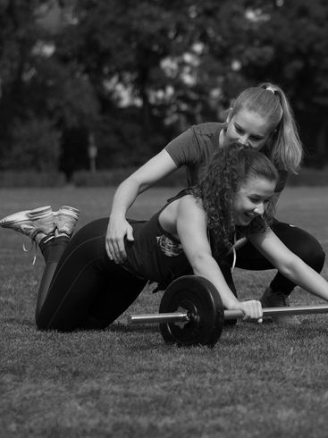 Hilfestellung bei Rollouts mit Langhantel