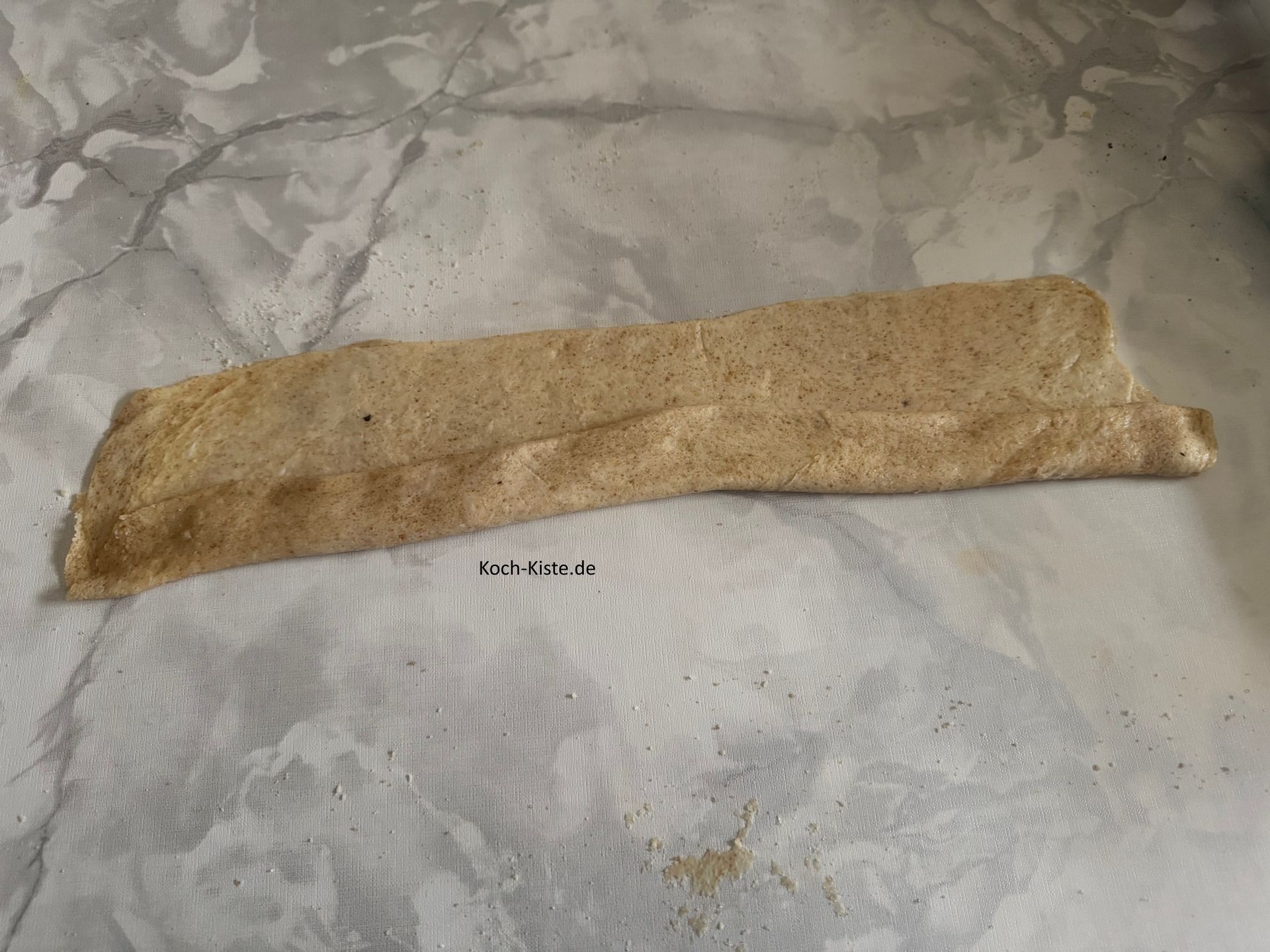 wiederholde den Vorgang und klappe den Teig ein 2 x um