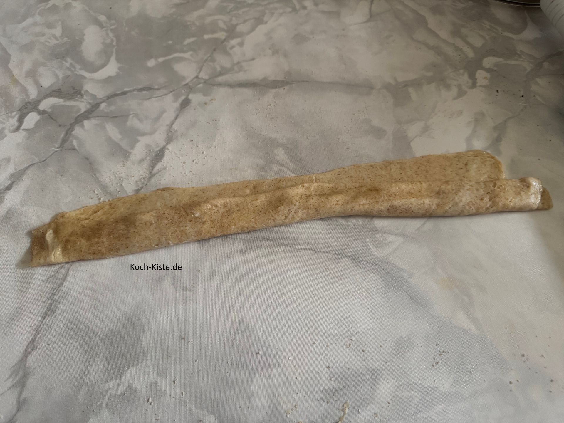 wiederhole den Vorgang erneut und klappe den Teig ein 3x um