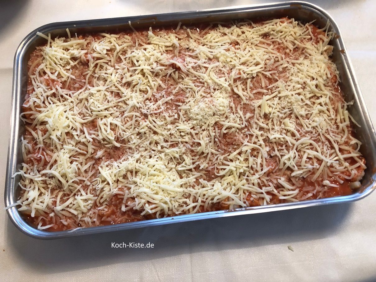 zum Schluss verteile den geriebenen Käse gleichmäßig