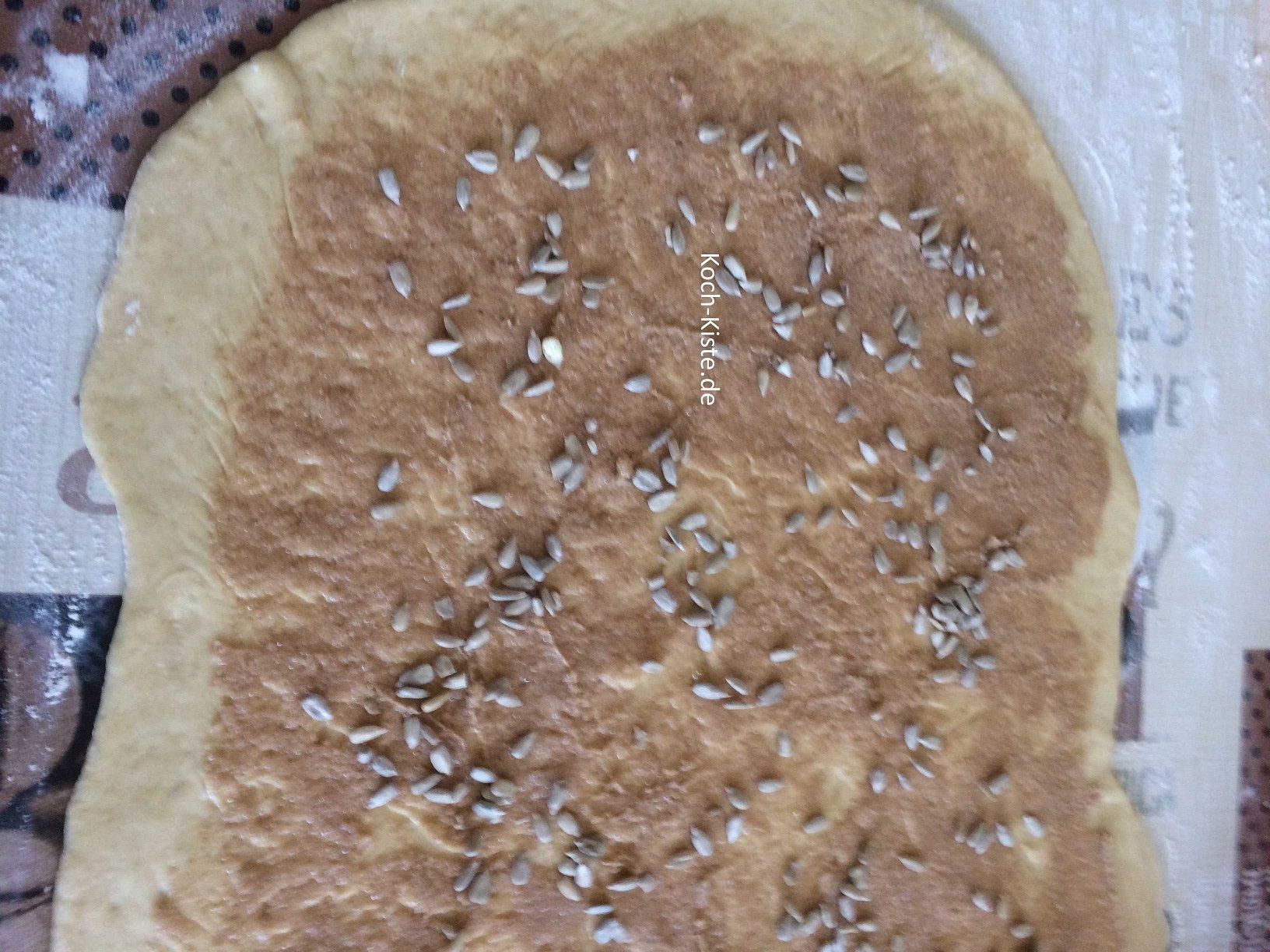 Sonnenblumenkerne oben auf geben