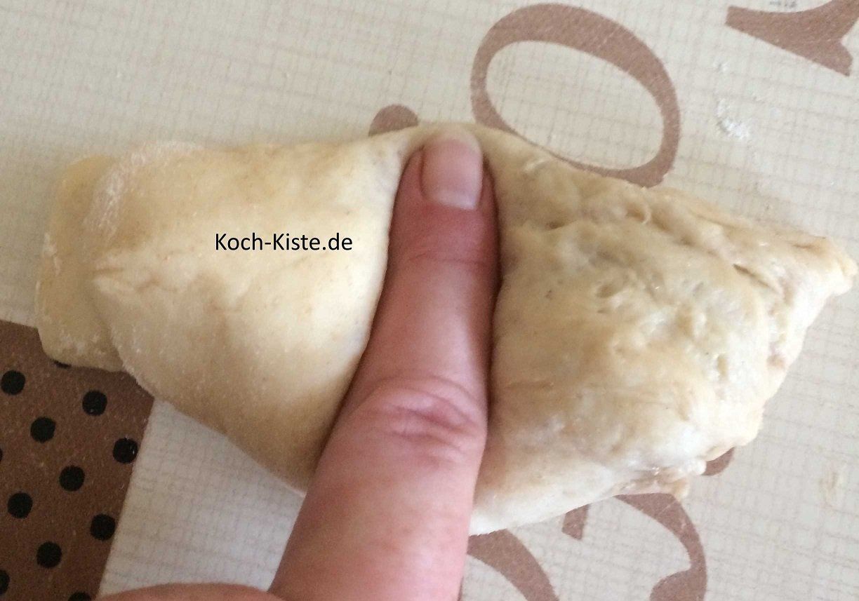 eine Vertiefung in die Mitte drücken