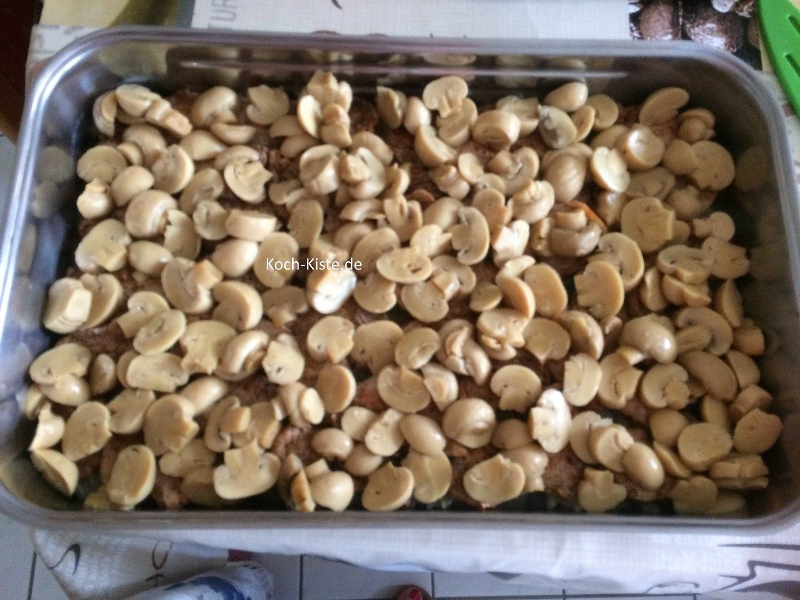 Champingnon auf das Schweinefilet geben